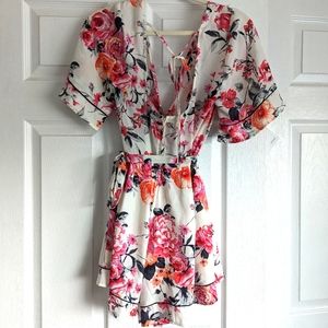 Never worn floral romper from Francesca's